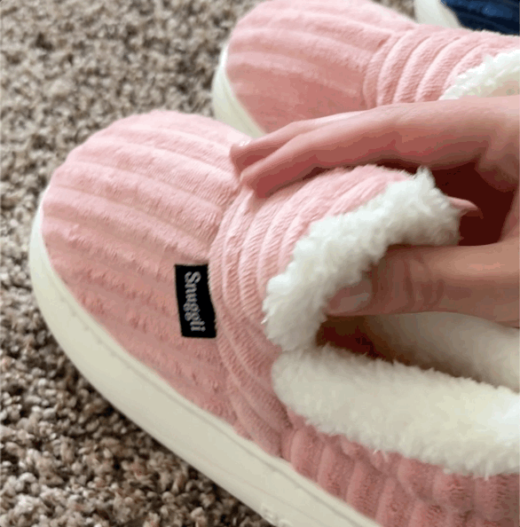 Brown Snuggli slippers with a cushioned platform sole