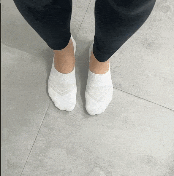 Green Snuggli slippers with cream lining